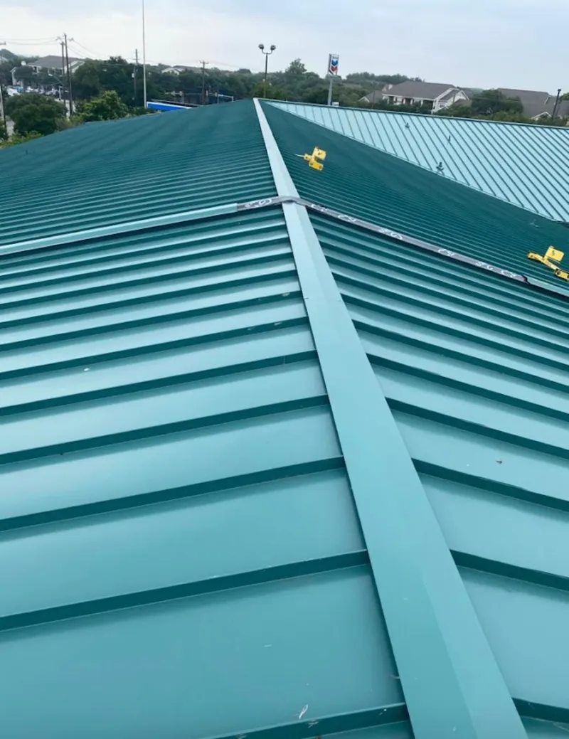 Green commercial metal roof ridge and valley for Metal Roof Repair in New Orleans
